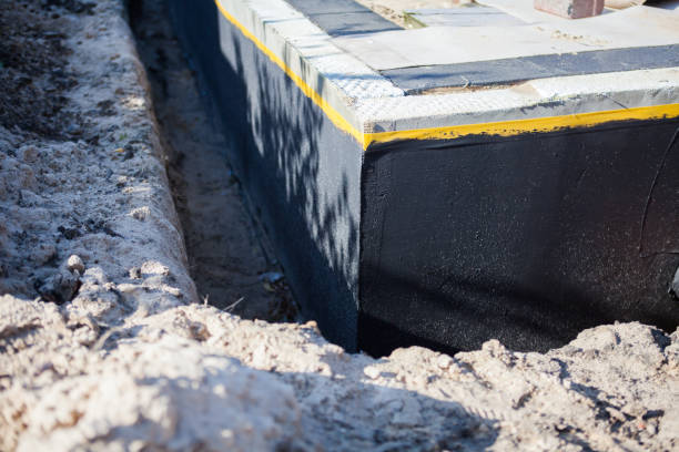 Professional Waterproofing technician working in Lomira, WI